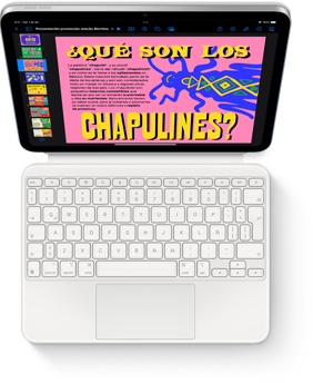 Imagen desde arriba de un iPad conectado a un Magic Keyboard Folio en color blanco.