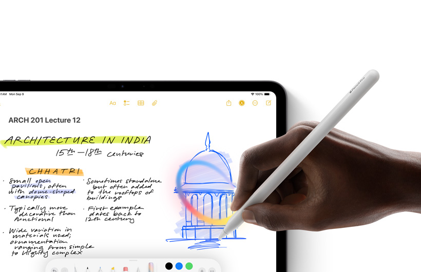 Mão segurando o Apple Pencil e fazendo um círculo ao redor de um desenho no app Notas no iPad.