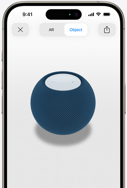 Der HomePod in Blau auf dem Display eines iPhone in AR Ansicht.