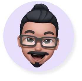 Memoji de visage souriant - un homme barbu portant des lunettes