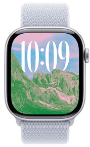 Apple Watch 的螢幕展示以風景圖、自訂時間大小及語言文字組成的照片錶面。